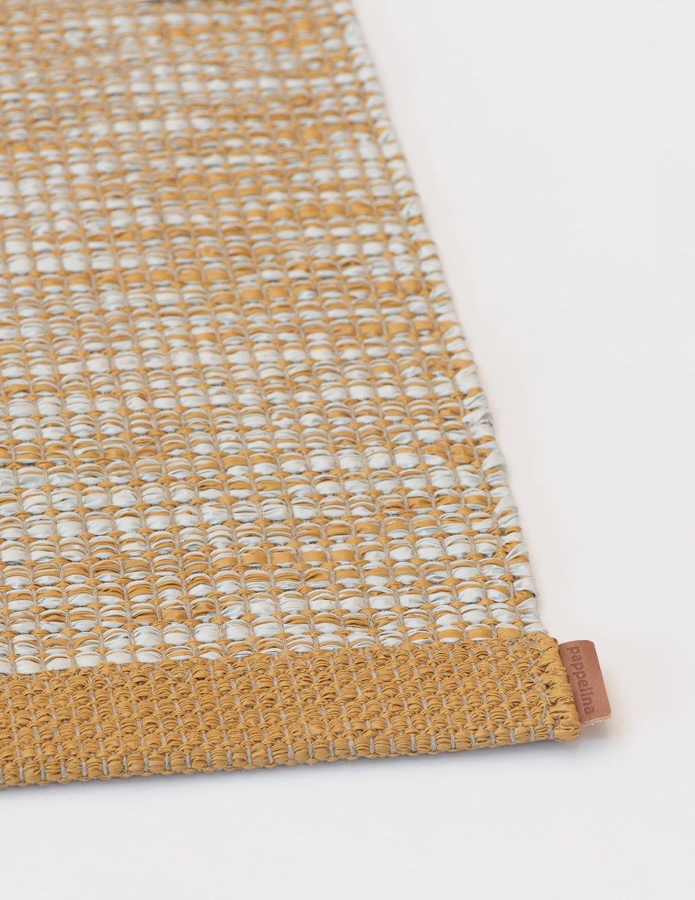 Pappelina-Sam-Ochre-Carpet